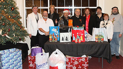 A Classic Rock Christmas and the staff of the Levoy Theater in Millville, NJ and some ofthe donations they collected,